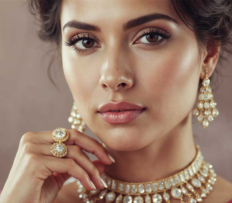 Woman wearing gold jewellery